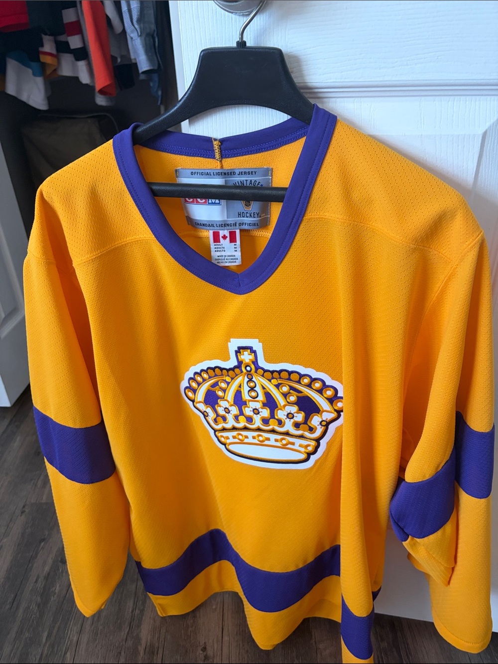 CCM Gold Hockey Jersey with Purple Trim